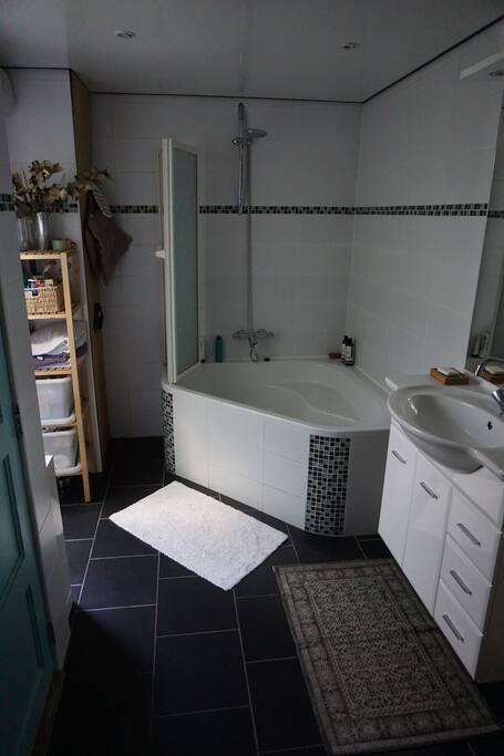Bathroom with bath, shower and toilet