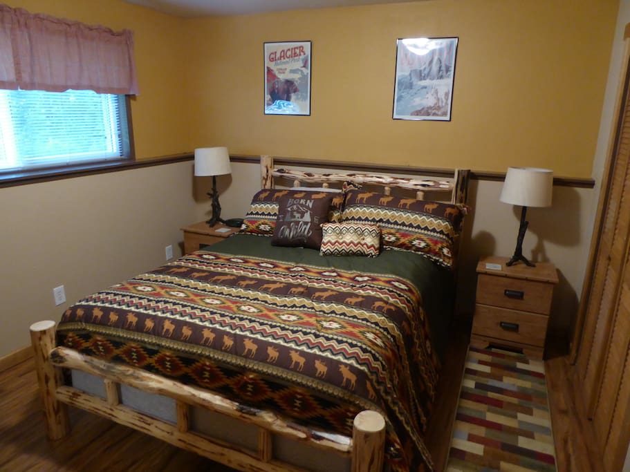 Queen bed with Montana made log frame