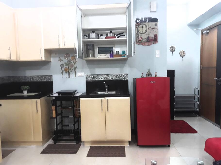 my kitchenette with basic kitchen utensils,electric stove