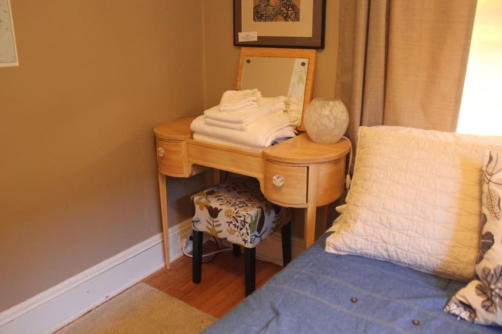 White wash, hand, and bath towels are provided for both guests.