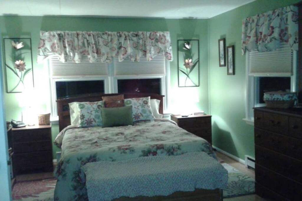 Pictured is downstairs bedroom number one.