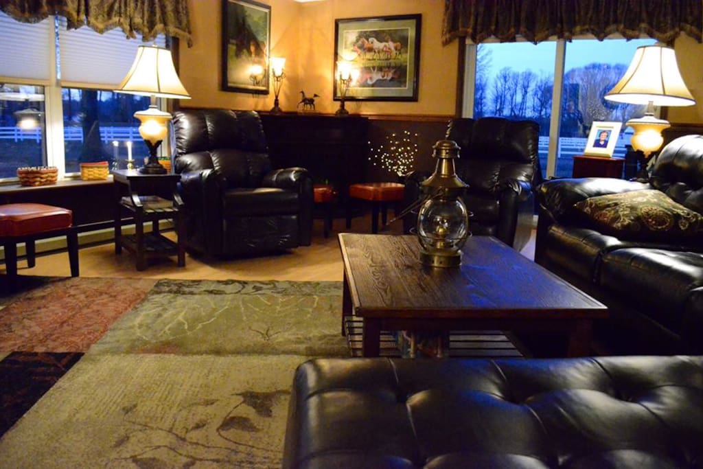 Sun room sitting area complete with cable television and an overlook of the farms pastures.