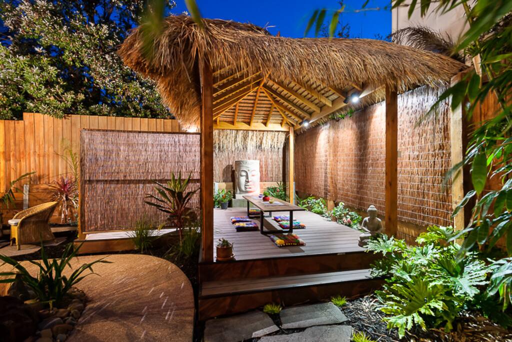 large BBQ on the L-shaped deck under the Balinese styled gazebo
