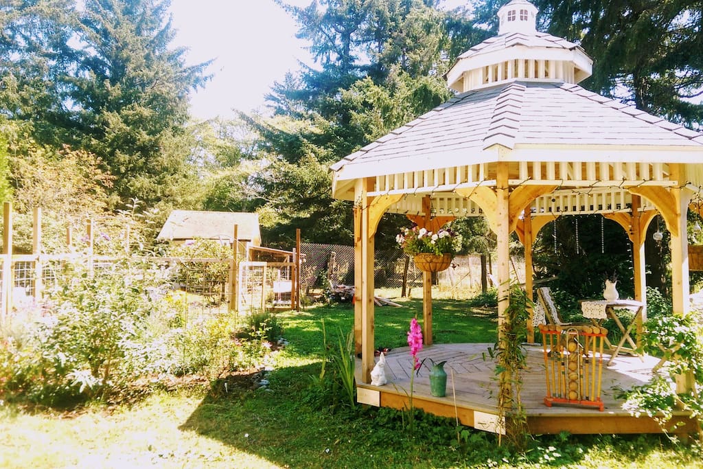 Relax in our garden underneath the shade of our gazebo.