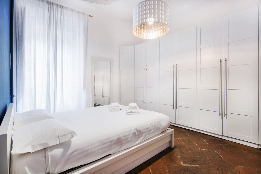 The bedroom & the spacious wardrobe