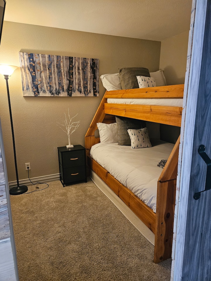 2nd bedroom with twin over full bunk beds and trundle bed