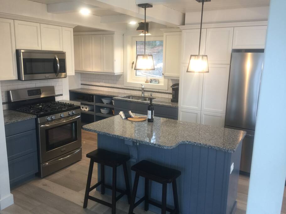 New Kitchen with Stainless Steel Appliances and Granite Countertops