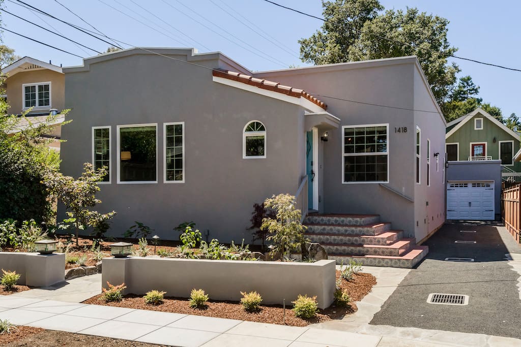 We love the Spanish style. The tiles on the front steps are hand painted. Brand new landscaping and driveway, with electric vehicle charger (let us know if you need it so we can make it available for you!).