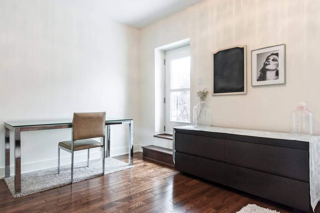 Bedroom with patio overlooking street