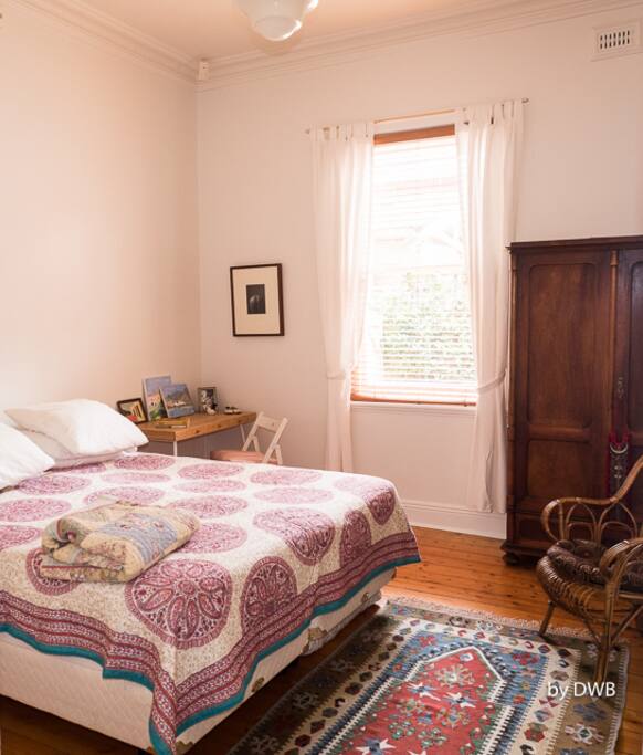 Another bedroom with a king-size bed.