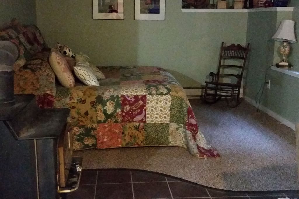 King size bed with wood burning stove