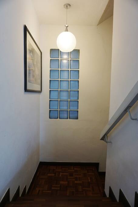 Stairs from the entrance leading down to the unit.
