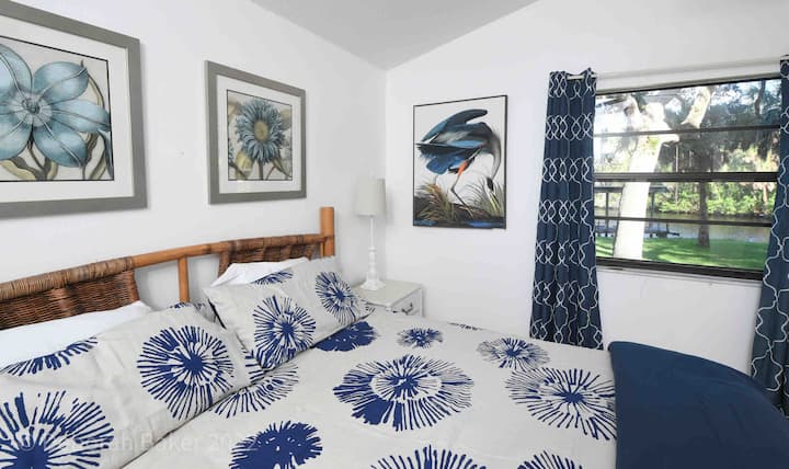 Calming blues, water views, and a comfy King-sized bed!