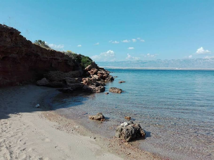 Duboka draga-The untouched nature in combination with the red rocks and sandy beach will surely delight you. (the northwest of the island)