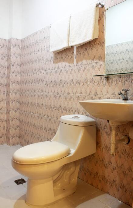 Private bath room with hot and cold shower.