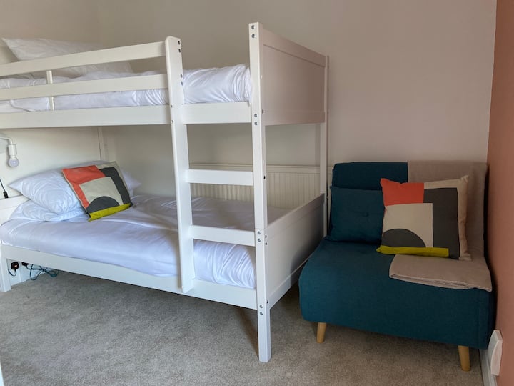Bunks with a fold out single sofa bed 