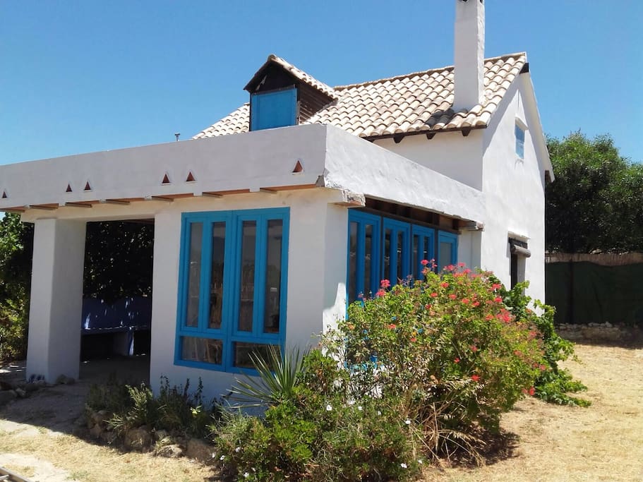 The house is complete with a large outdoor covered area.