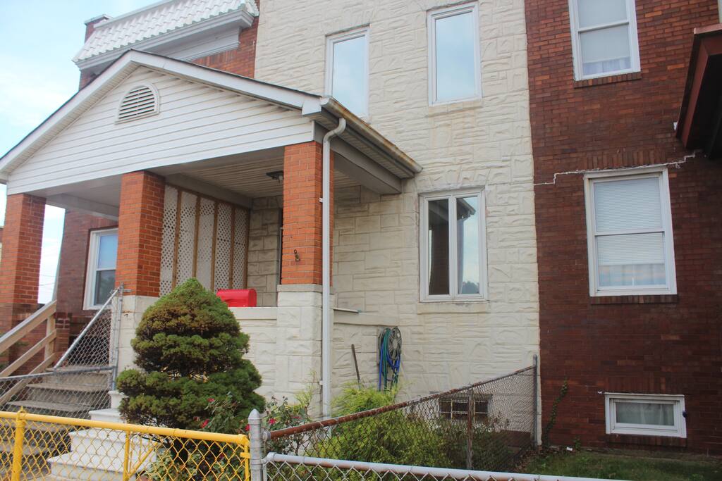 Front porch/patio fenced garden enclosure.