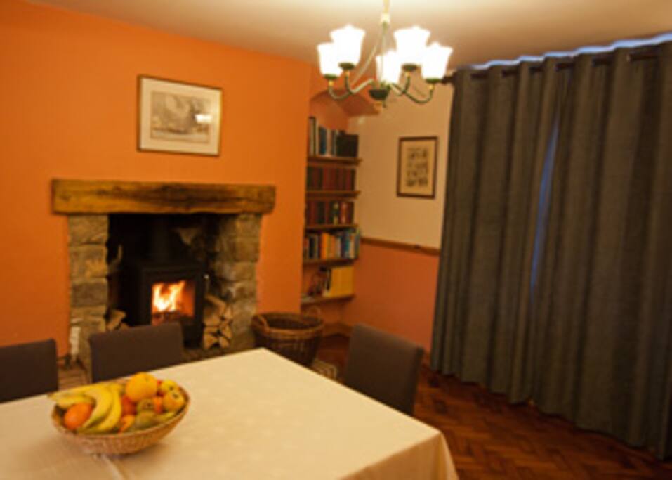 The dining room also has a book library, including some children books.