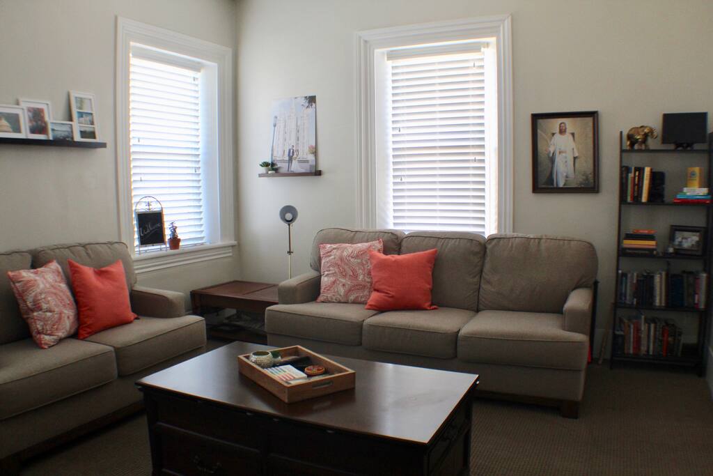 We are known for our comfy couches and our unique coffee table that lifts up to turn into a desk with many board games hidden underneath for your enjoyment.