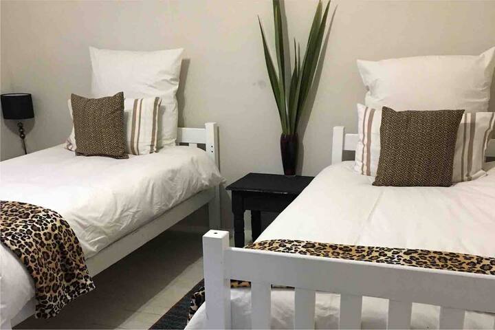 Twin bedroom this includes a roll out mattress for that additional sibling