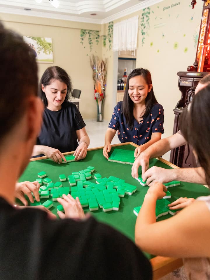 Learning to Play Mahjong