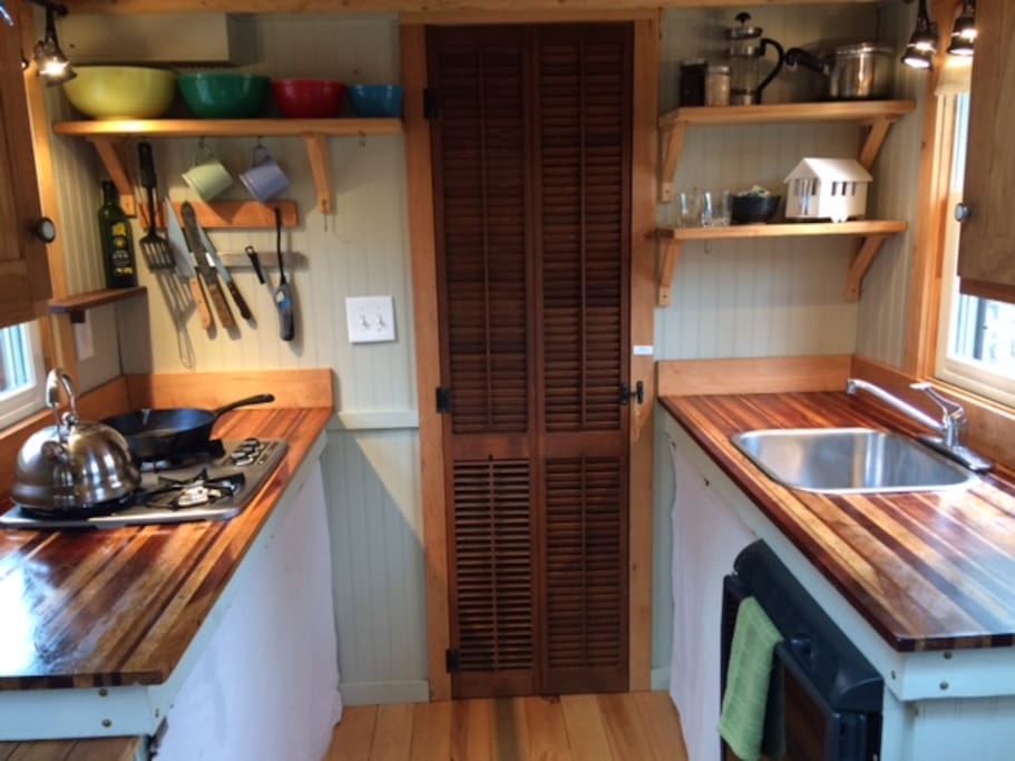 You can make breakfast, coffee, and more in the fully-functioning kitchen (dishes, cookware, oil, salt & pepper included).