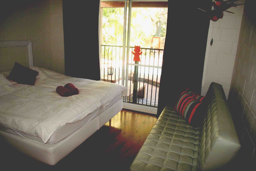 Main Bedroom with possible extra double. Access to pool.