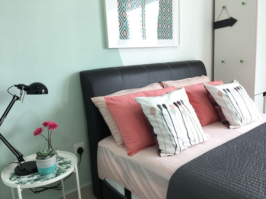 Bed and side table with table lamp