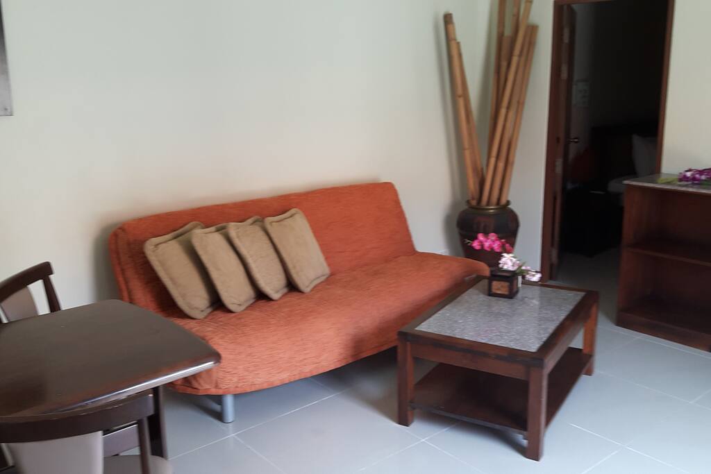 separate lounge with double slumberland sofa bed.