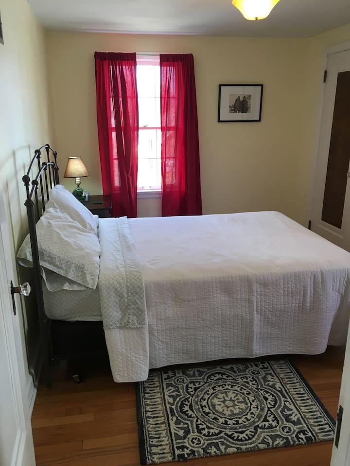 The second bedroom (full-sized bed) facing front of the house. 