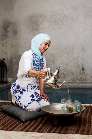 our caretaker serving fresh min tea