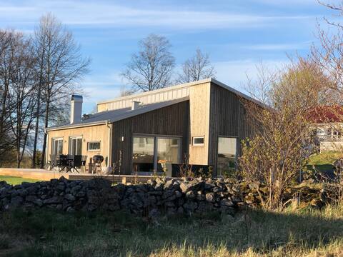 Stunning, new home with a lakeview