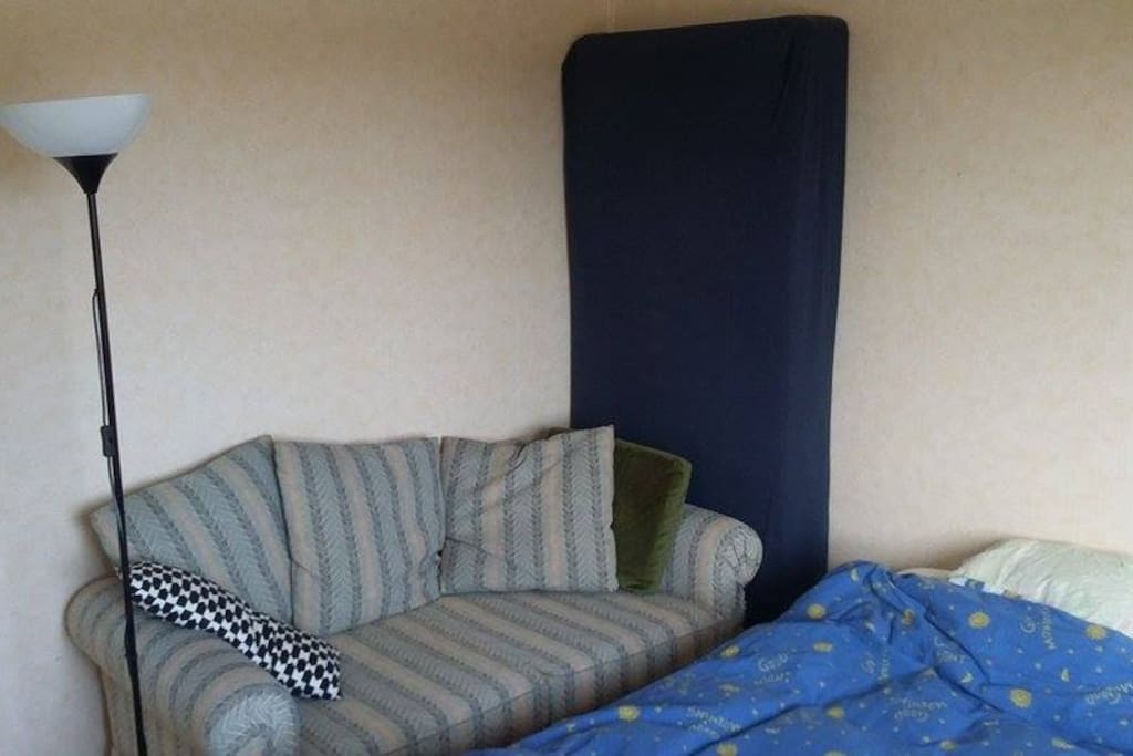 Couch, extra bed and bed.