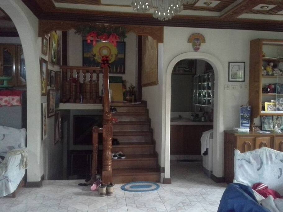stairs going up and down to the four bedrooms