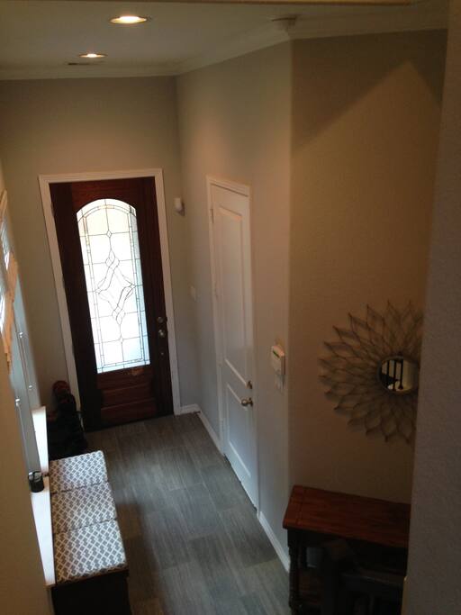 Front entrance connects to the garage.