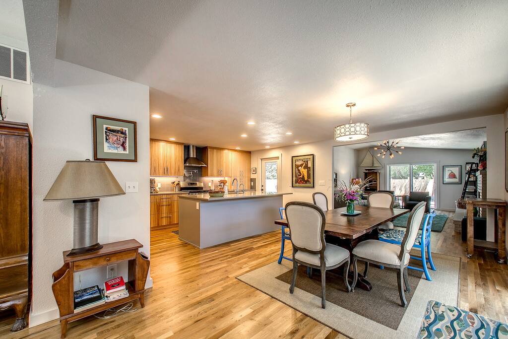 The large kitchen and dining table draw everyone together for conversation.