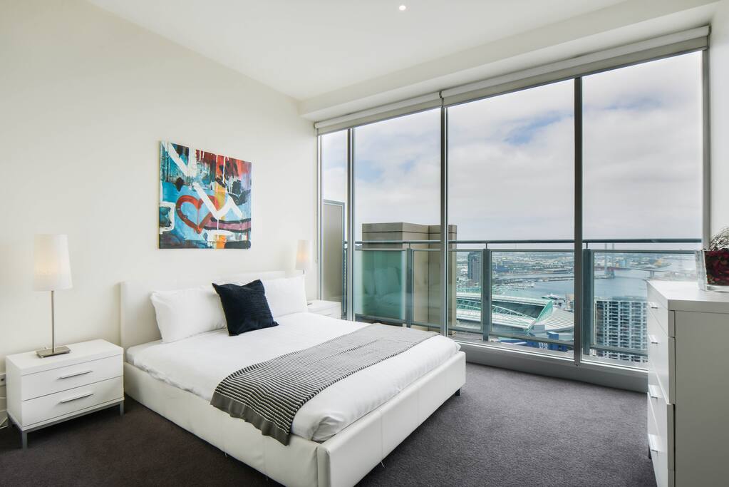 Master bedroom with sweeping view of Victoria Harbour