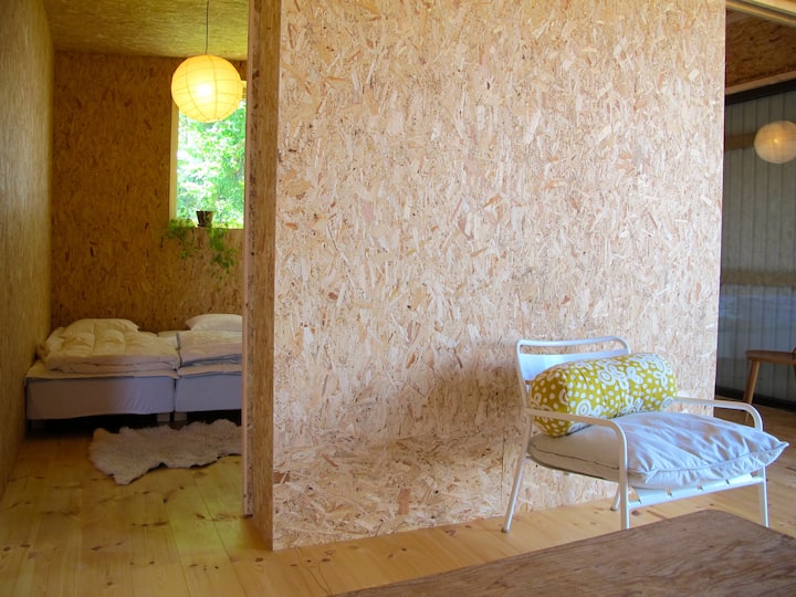 ห้องนอนเล็กกว่าพร้อมเตียงสองเตียง