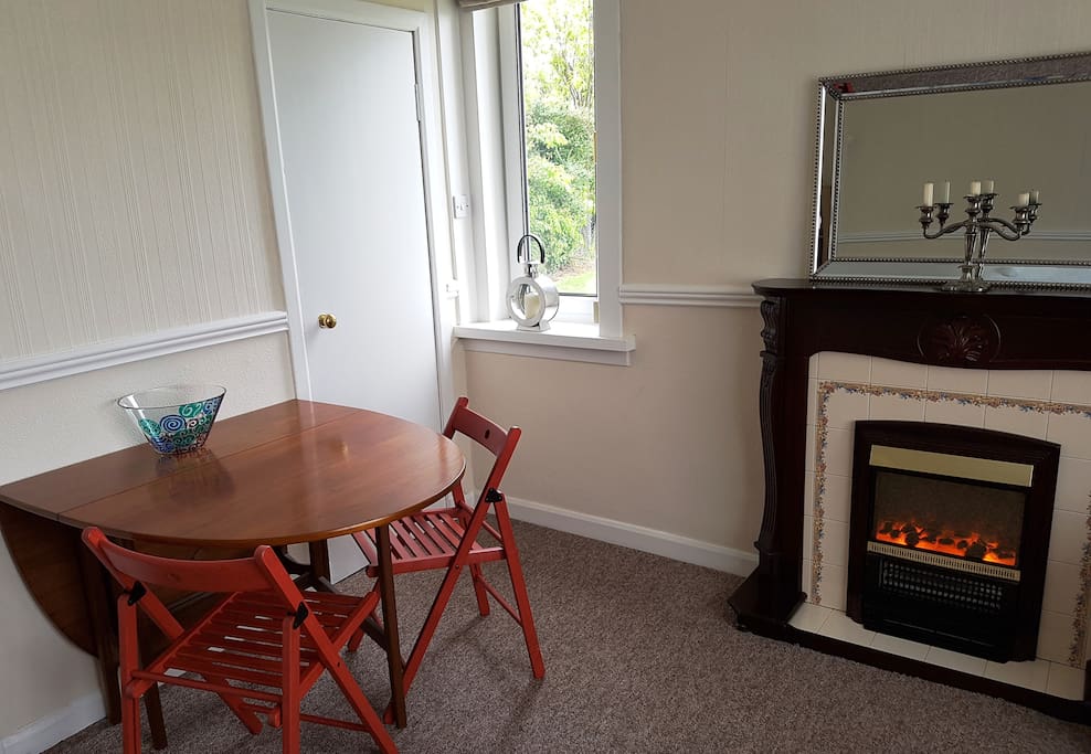 Table folds out and can accommodate six