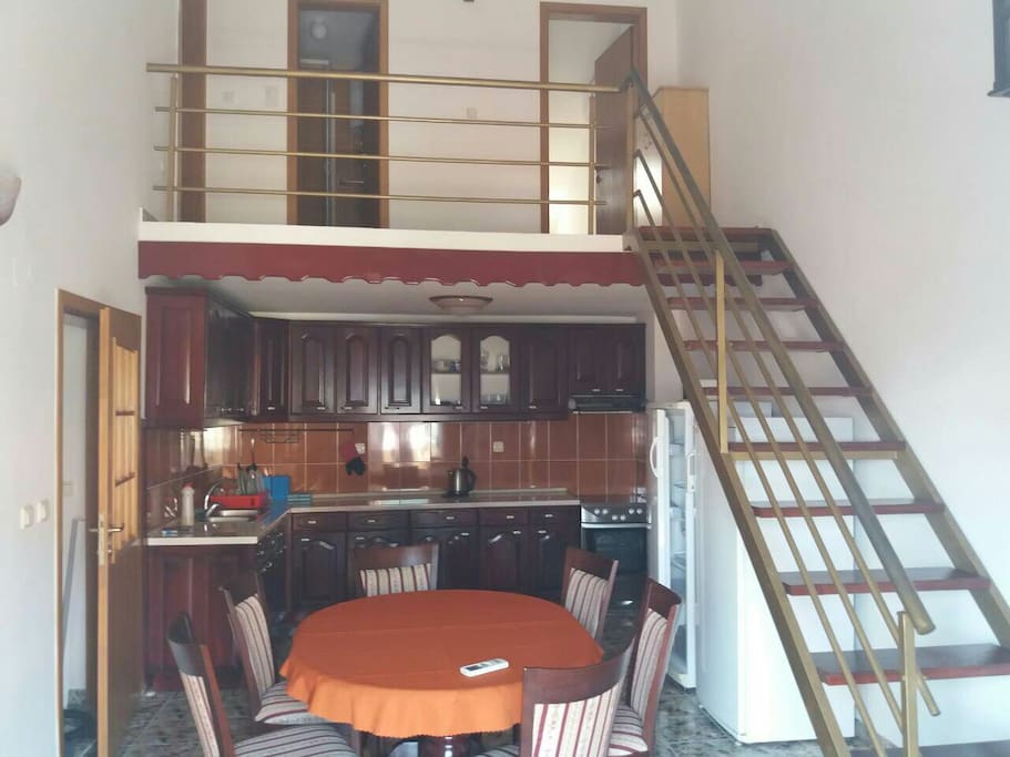 kitchen and stairs to 3 bedrooms