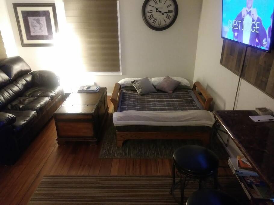 Futon fold down sofa sleeper in living room :)