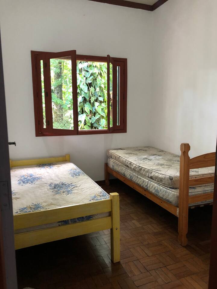 Bedroom 2 - two single beds, plus one mattress