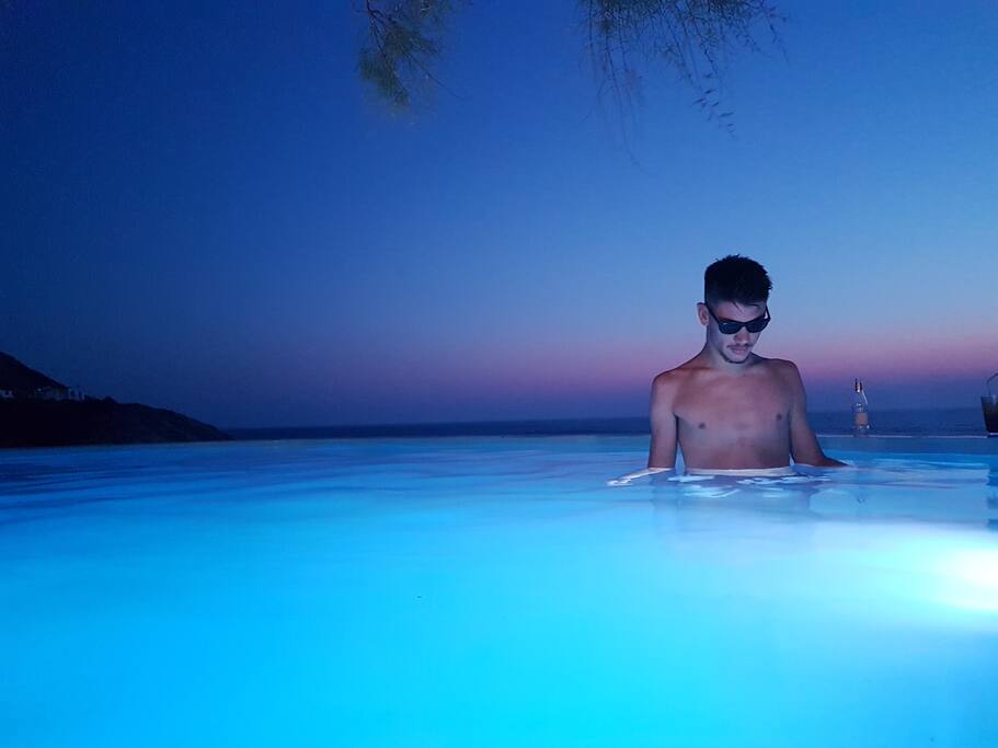 The private seawater swimming pool at night.