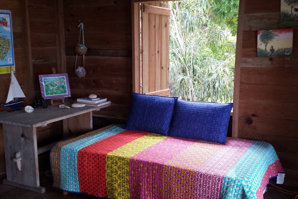 Lounge area with daybed and desk