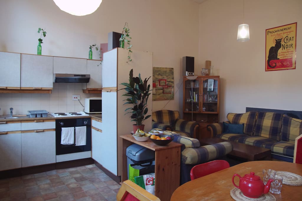 The Sitting Room with Kitchen and Dining table