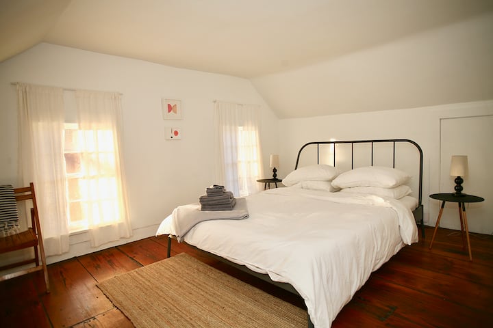 Sleep in late in our master bedroom with a queen-sized bed.