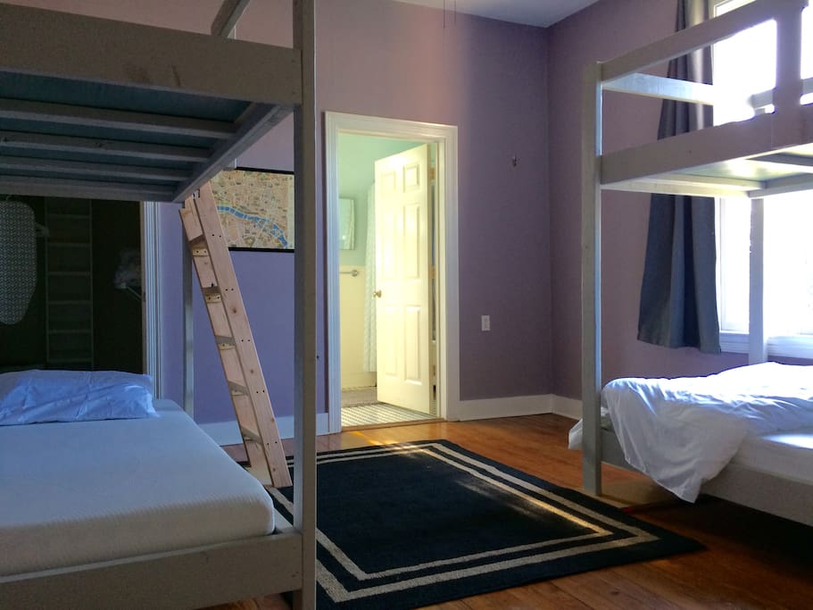 The room contains 4 beds.