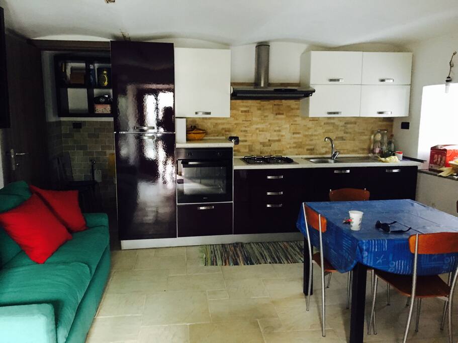 Soggiorno ingresso living con divano letto
