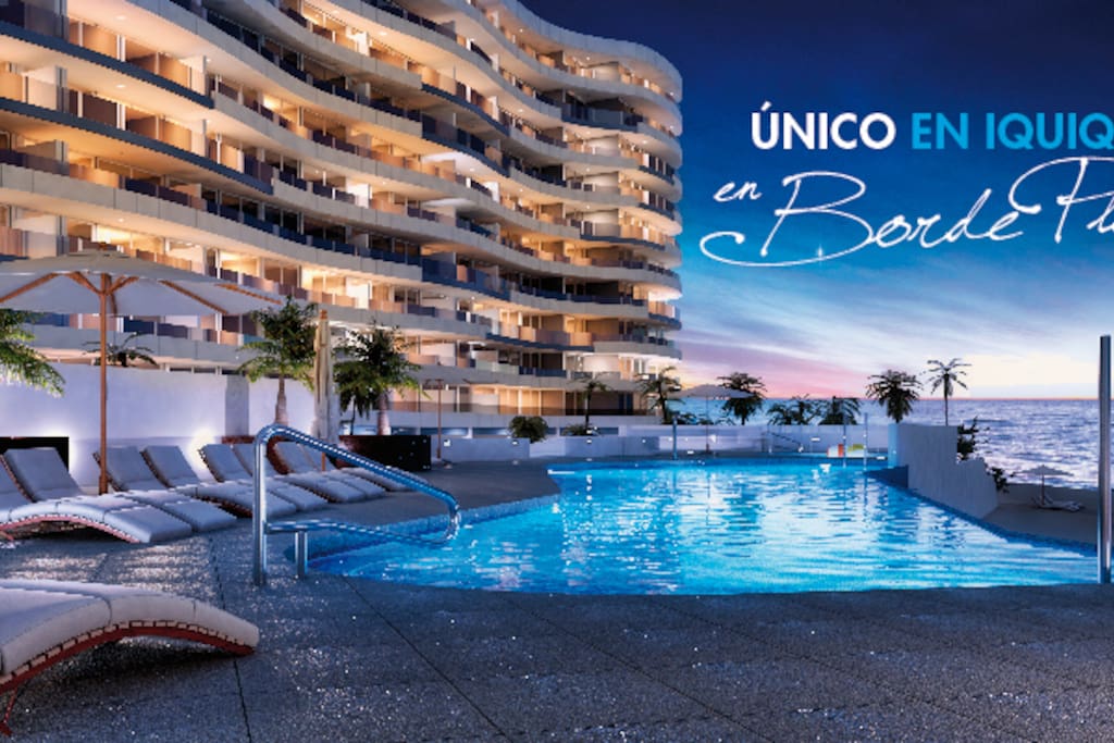 Maravilloso departamento Dúplex con vista y acceso al Mar, único en Iquique al borde costero.
Ven a disfrutar en Familia de este espectacular ubicación privilegiada en la Hermosa ciudad de Iquique
El departamento cuenta con cocina 100% equipada, 2 dormitorios, 3 baños, living comedor y terraza ideal para familias que deseen disfrutar y descansar, además cuenta con Internet WIFI, TV-Cable y estacionamiento.
El edificio cuenta con piscinas para adulto y niños, salón de eventos, juegos infantiles y quinchos.
Acceso privado a Playa Huantajaya.
A pasos de supermercados, estación de servicios y de Playa brava.
20 minutos desde el Aeropuerto Diego Aracena y a 5 minutos de Playa Cavancha.